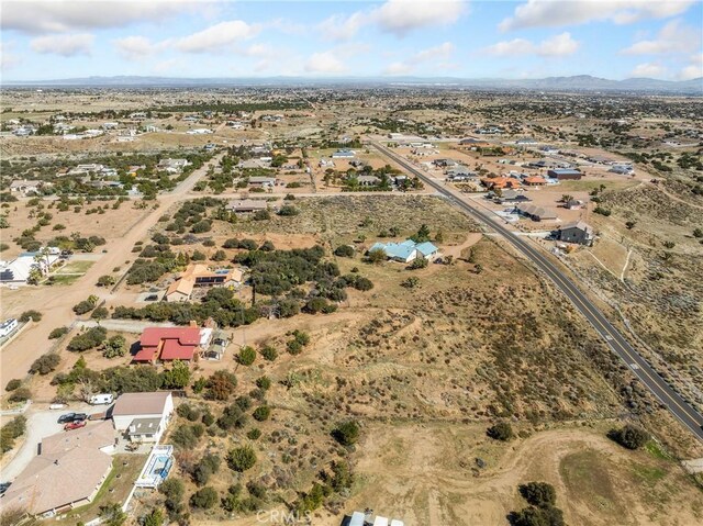 8187 Anaconda Ave, Oak Hills, CA 92344 - bird's eye view featuring a desert view and a mountain view