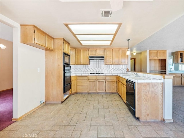 8187 Anaconda Ave, Oak Hills, CA 92344 - kitchen featuring black appliances, light brown cabinets, and a peninsula