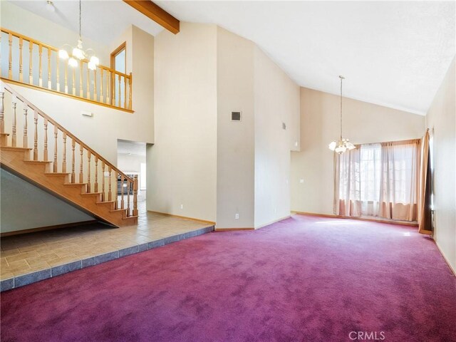 8187 Anaconda Ave, Oak Hills, CA 92344 - unfurnished living room with carpet floors, visible vents, a notable chandelier, and beam ceiling