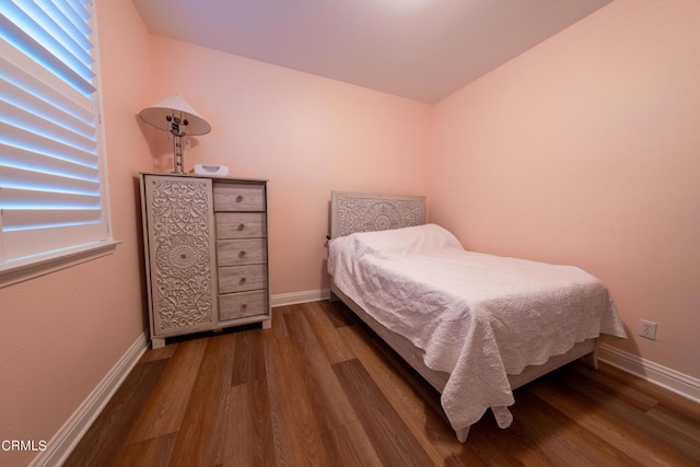 bedroom featuring hardwood / wood-style flooring