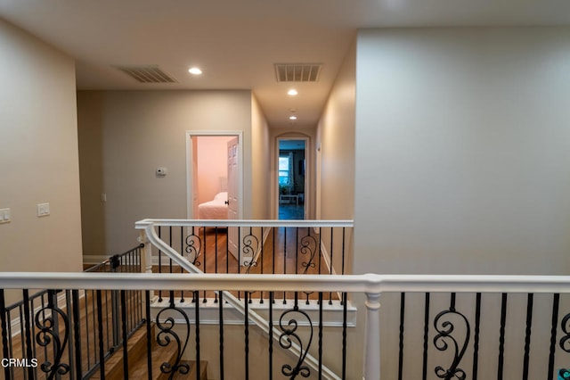 hallway with wood-type flooring