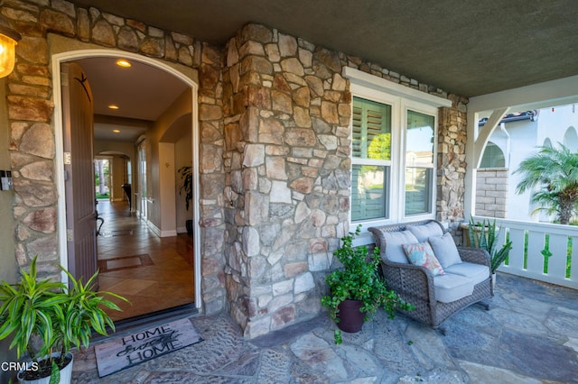 property entrance featuring covered porch