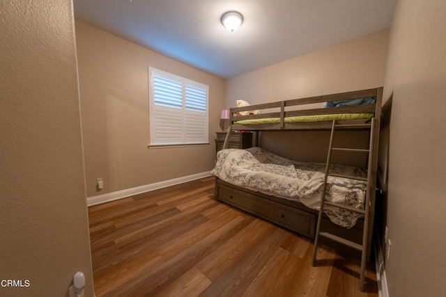 bedroom featuring hardwood / wood-style flooring