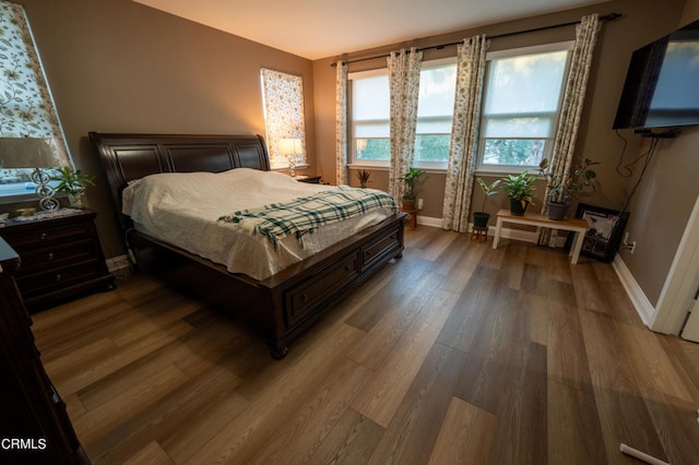 bedroom featuring hardwood / wood-style flooring