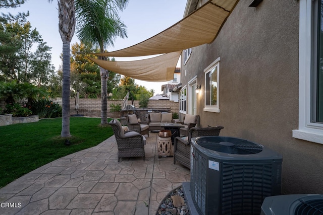 view of patio with cooling unit and an outdoor living space