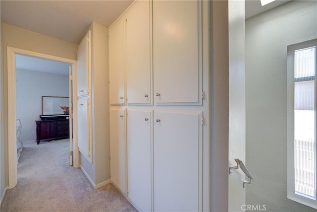 2650 Main St Unit 7, Cambria, CA 93428 - hall with light colored carpet and baseboards