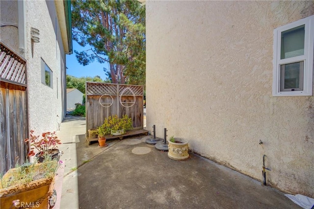 view of patio / terrace featuring a shed