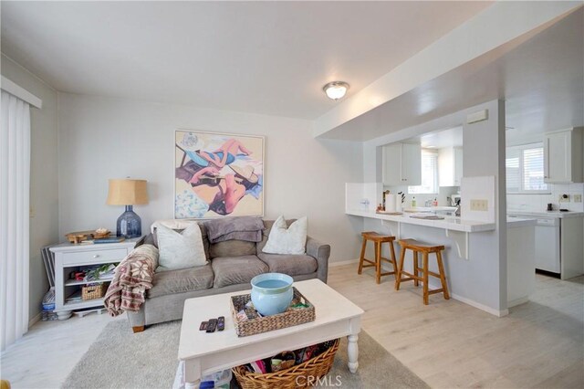 2650 Main St Unit 7, Cambria, CA 93428 - living area with light wood-type flooring and baseboards