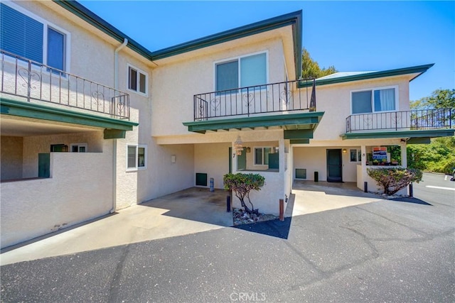 2650 Main St Unit 7, Cambria, CA 93428 - view of front of property featuring stucco siding and a balcony