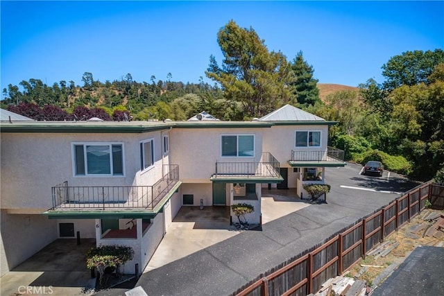 2650 Main St Unit 7, Cambria, CA 93428 - back of house featuring a fenced backyard and stucco siding