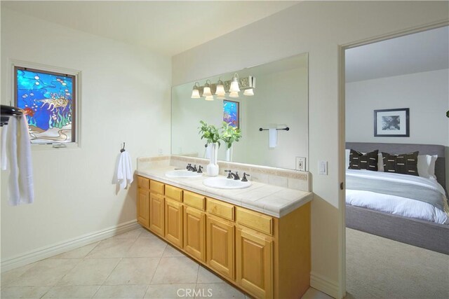 4347 Canyon View Ln, Palos Verdes Peninsula, CA 90274 - bathroom with double vanity, ensuite bathroom, and tile patterned floors