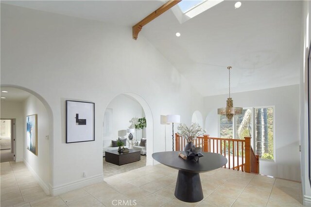 4347 Canyon View Ln, Palos Verdes Peninsula, CA 90274 - corridor with beamed ceiling, high vaulted ceiling, arched walkways, light tile patterned floors, and recessed lighting