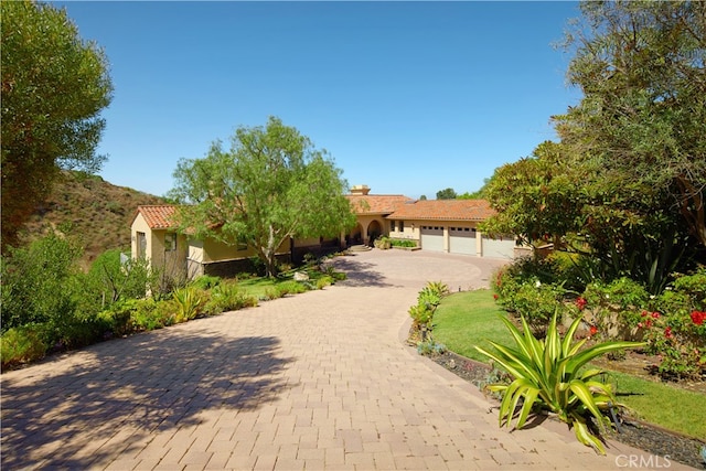 view of front of home with a garage