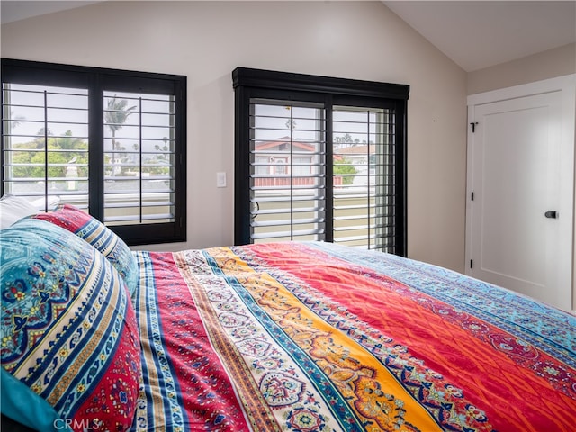 bedroom with vaulted ceiling