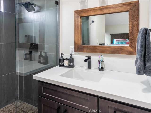 bathroom with vanity and an enclosed shower