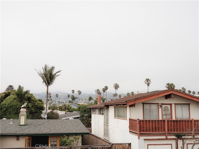 view of side of property featuring a mountain view