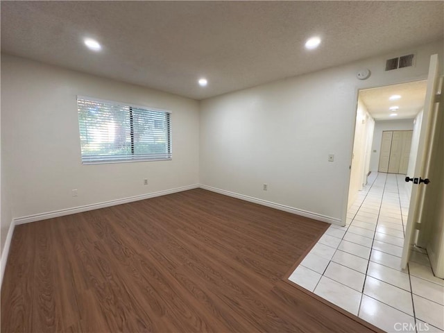 empty room featuring light tile patterned floors