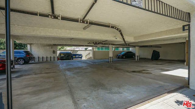 garage with a carport