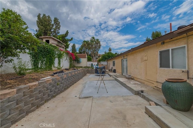 exterior space with a patio area