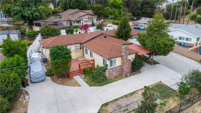 birds eye view of property with a residential view