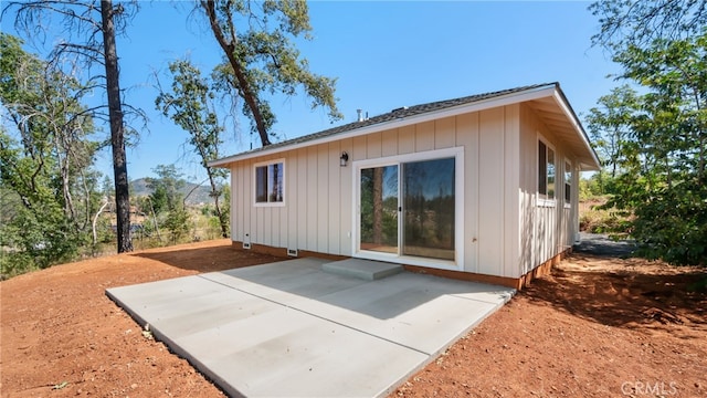 back of property featuring a patio area