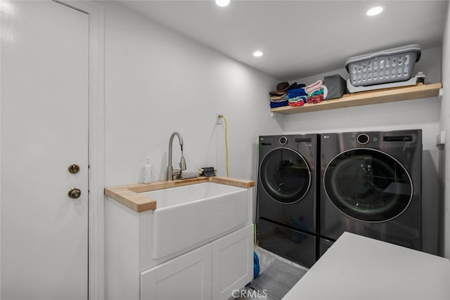 washroom featuring washing machine and dryer