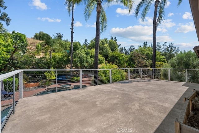 view of patio / terrace with a balcony