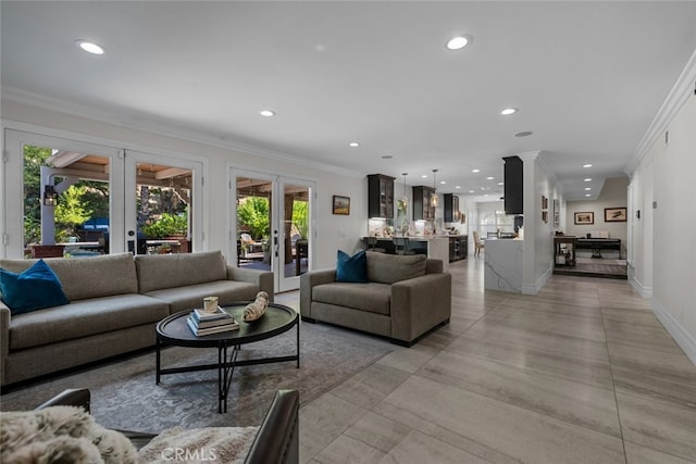 living room featuring french doors and ornamental molding