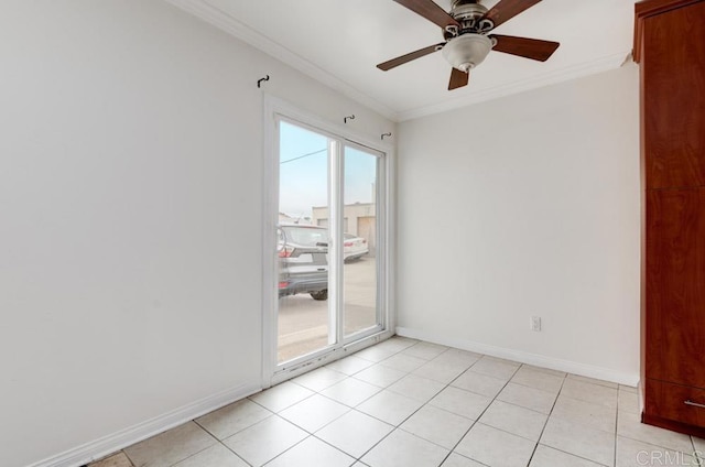 tiled empty room featuring a wealth of natural light, crown molding, and ceiling fan