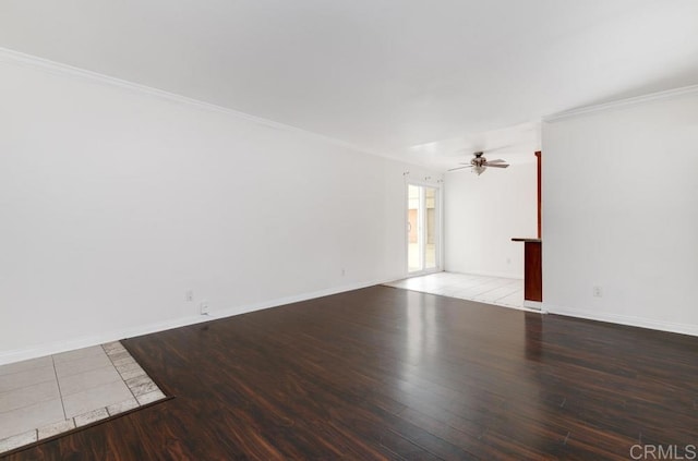 empty room with hardwood / wood-style floors, ceiling fan, and ornamental molding