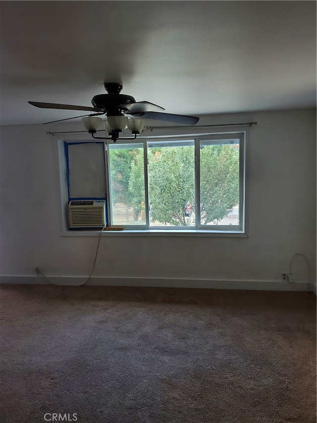 unfurnished room featuring cooling unit, carpet floors, and ceiling fan