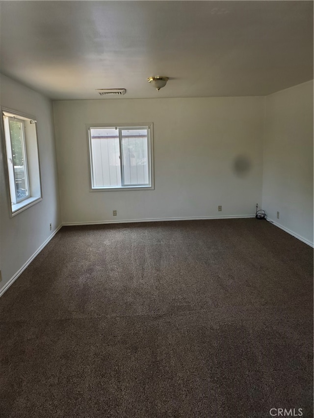 view of carpeted spare room