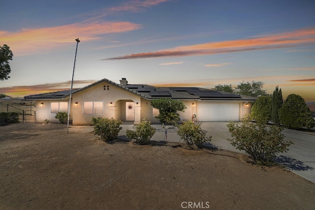 view of front of property featuring a garage