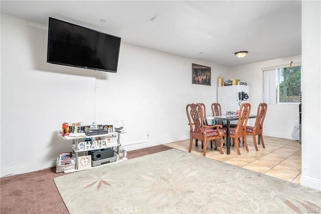 dining room featuring tile patterned flooring