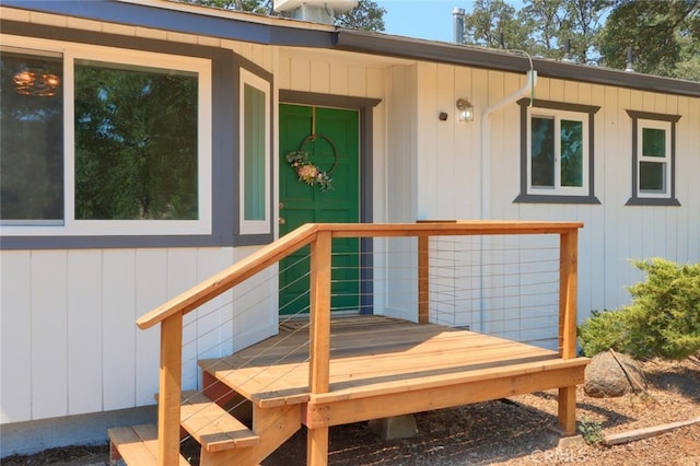 doorway to property featuring a wooden deck