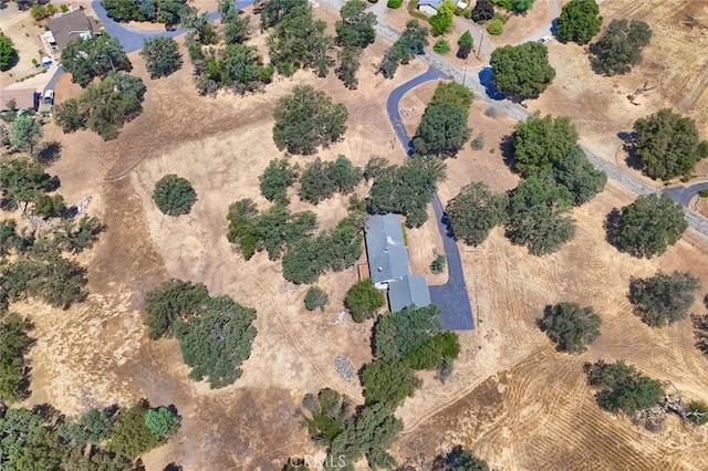 birds eye view of property featuring a rural view