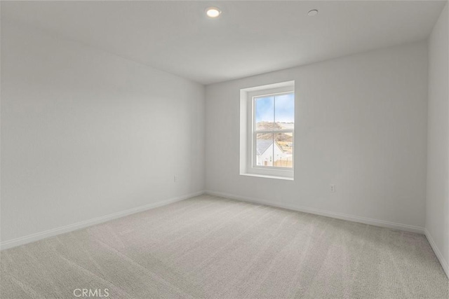 empty room featuring carpet flooring