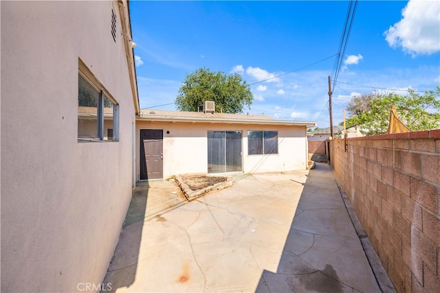 back of house featuring a patio area