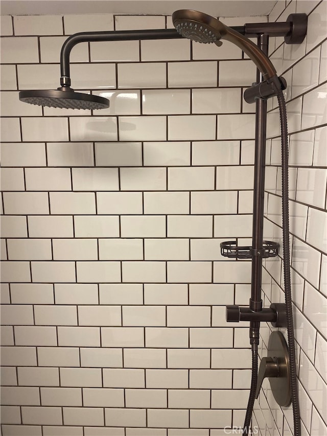 details with a tile shower