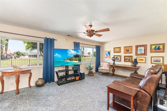 sitting room with carpet floors and ceiling fan