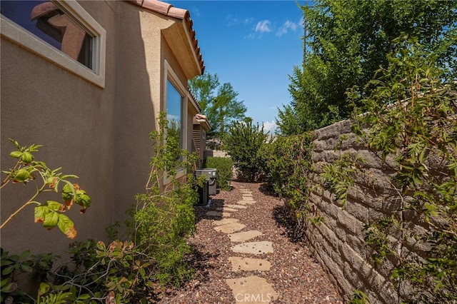 view of yard with central AC