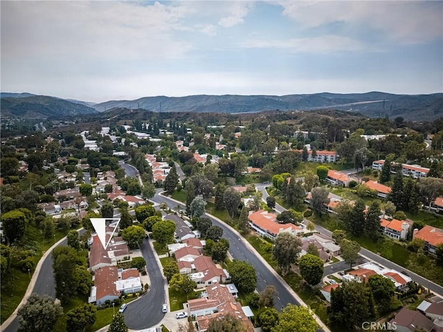 birds eye view of property with a residential view and a mountain view