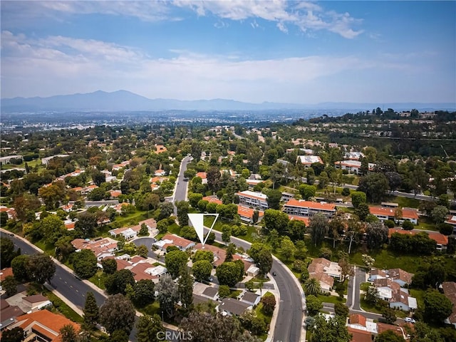 drone / aerial view with a residential view and a mountain view