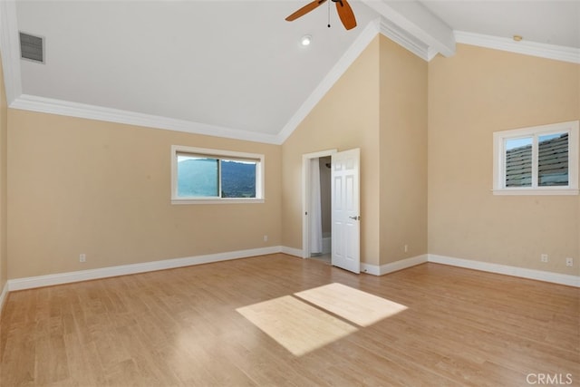 empty room with light hardwood / wood-style flooring, ornamental molding, beamed ceiling, and ceiling fan