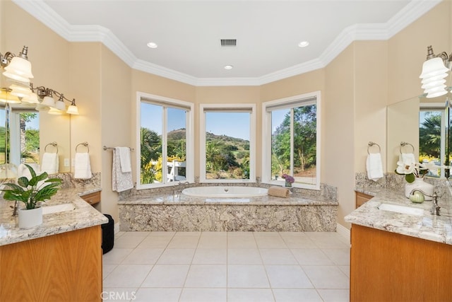 bathroom featuring vanity, ornamental molding, a relaxing tiled tub, and plenty of natural light