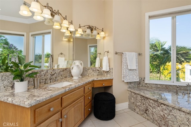 bathroom with vanity, crown molding, a healthy amount of sunlight, and tile patterned floors