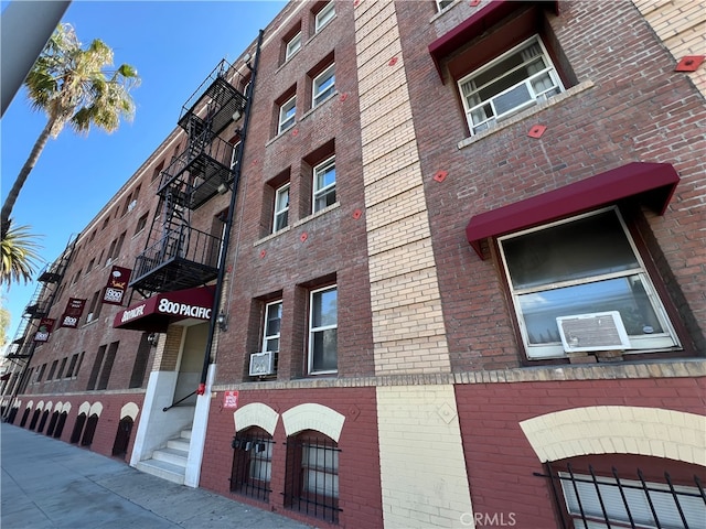 view of building exterior featuring cooling unit