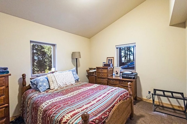 bedroom featuring lofted ceiling and carpet
