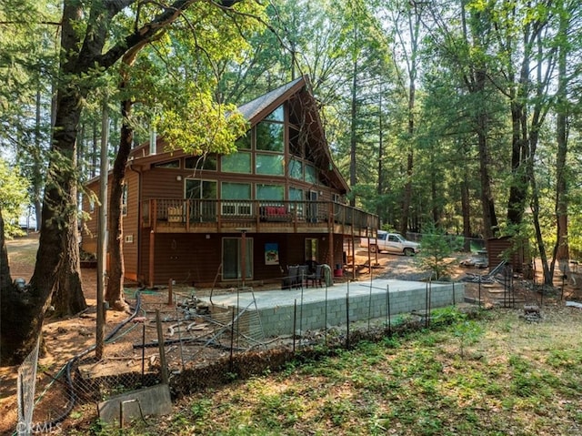 rear view of house with a deck