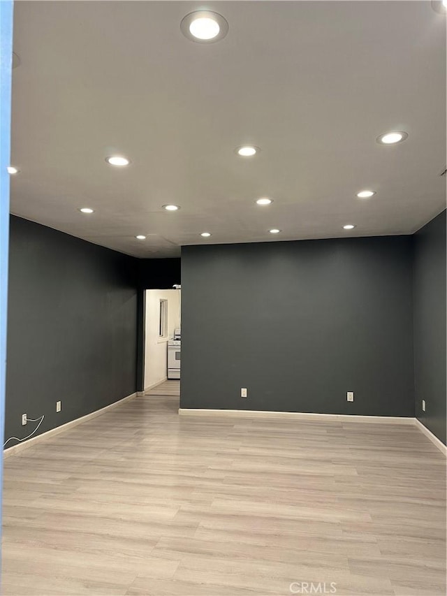 unfurnished room featuring light hardwood / wood-style floors